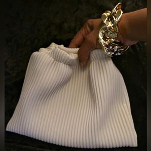 Beige faux leather jewelry handbag